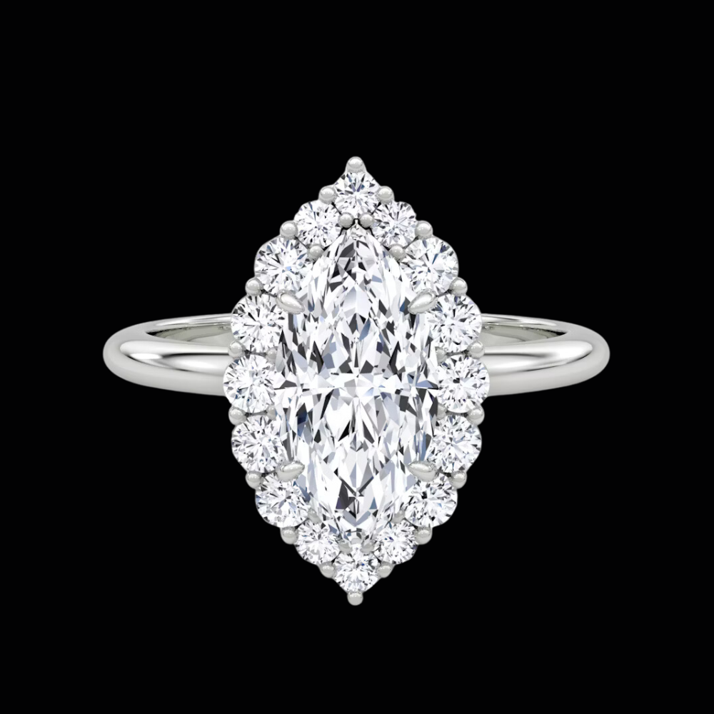 large marquise diamond in white gold setting with halo 